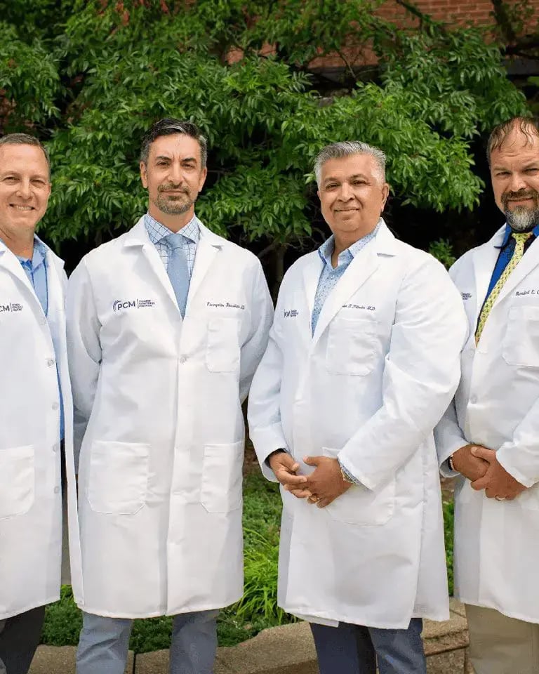 The doctors of Pioneer Concierge pose for a photograph
