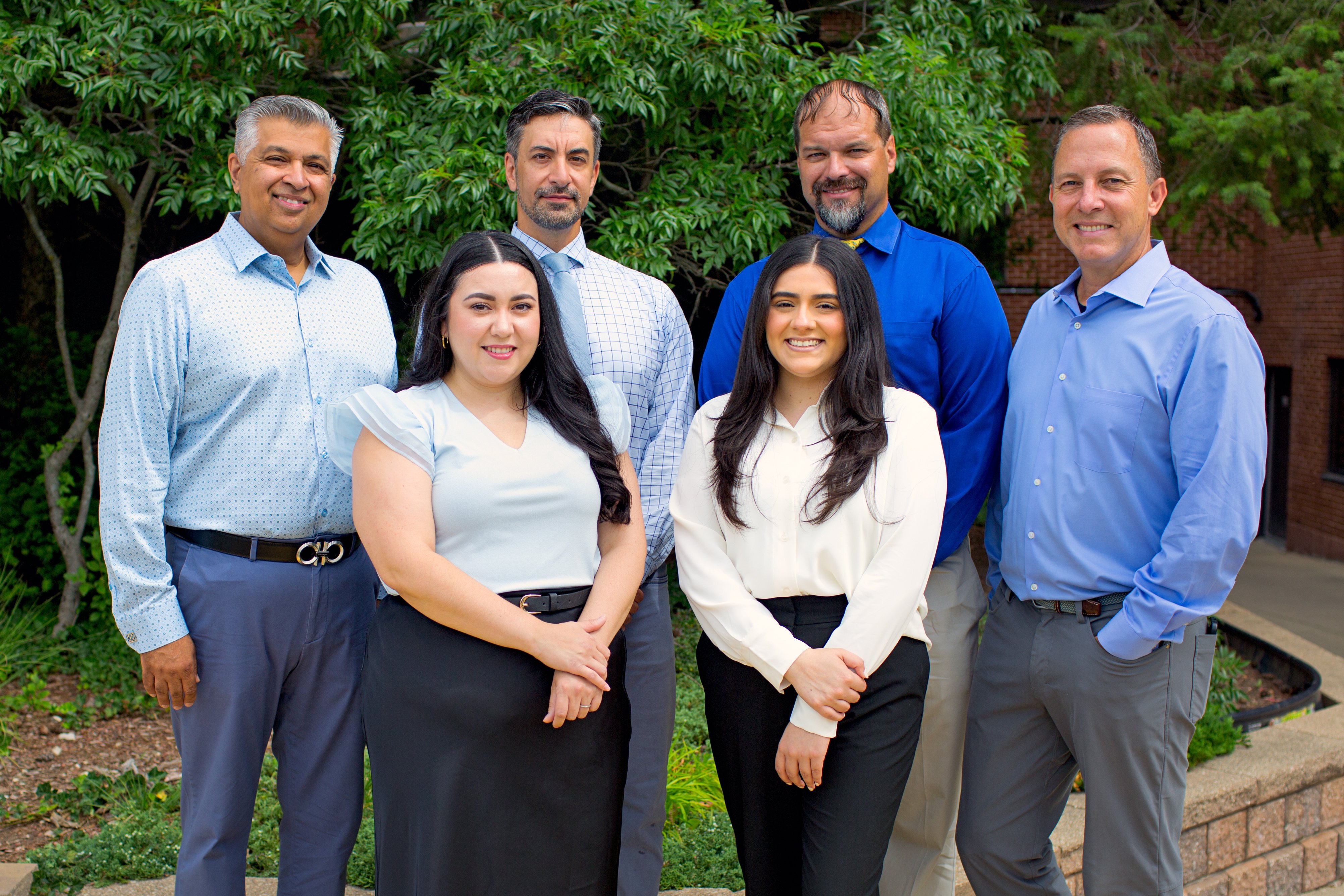 The staff of Pioneer Concierge Medicine pose for a photograph